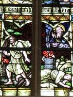 Buntglasfenster in der Pfarrkirche St. Philippus und Jacobus in Steinbeck Historisches Buntglasfenster in der Pfarrkirche St. Philippus und Jacobus in Steinbeck mit biblischen Szenen und der Inschrift